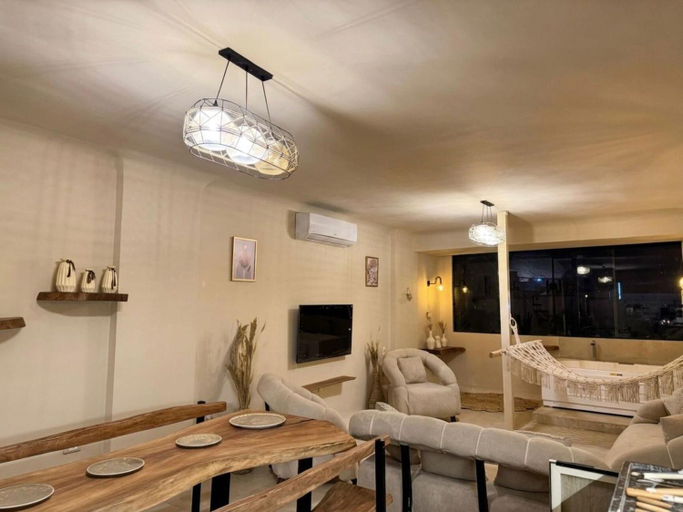 Shared lounge/TV area 2, nirvana pyramids view, Al-Ahram