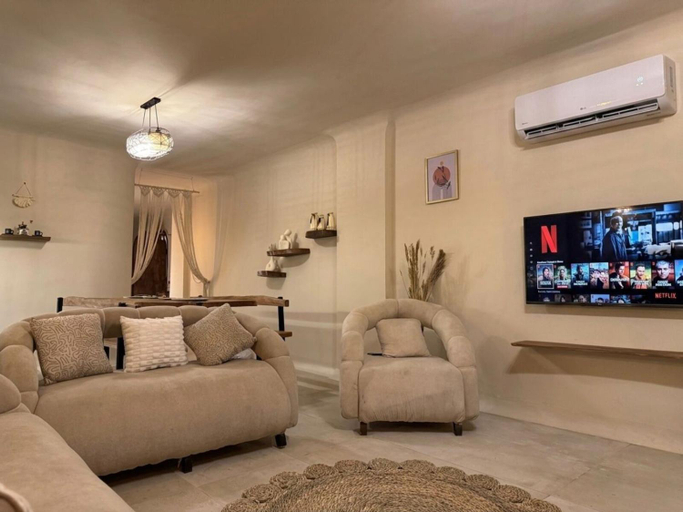 Shared lounge/TV area 4, nirvana pyramids view, Al-Ahram