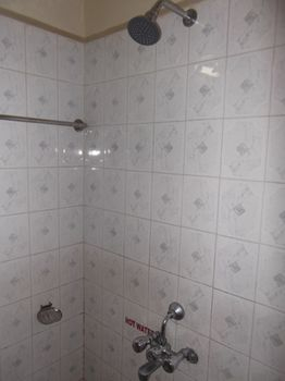 Bathroom 5, Hotel Ravikant, Pune
