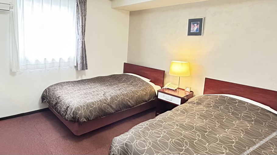 Bedroom 2, Kuki City Hotel, Kuki