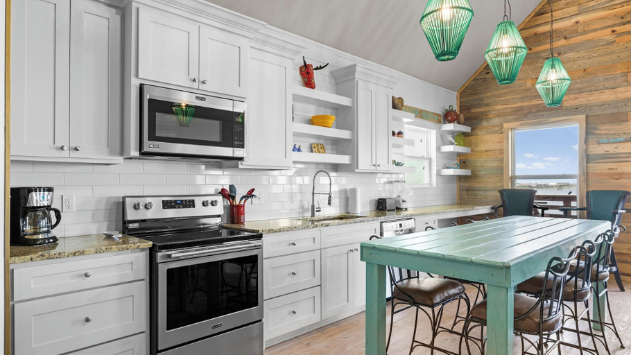 Others 4, Waterfront Escape w/ Views Shared Pool & Boat Dock Orange Crush by Avantstay, Nueces