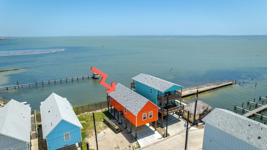 Exterior & Views 2, Waterfront Escape w/ Views Shared Pool & Boat Dock Orange Crush by Avantstay, Nueces