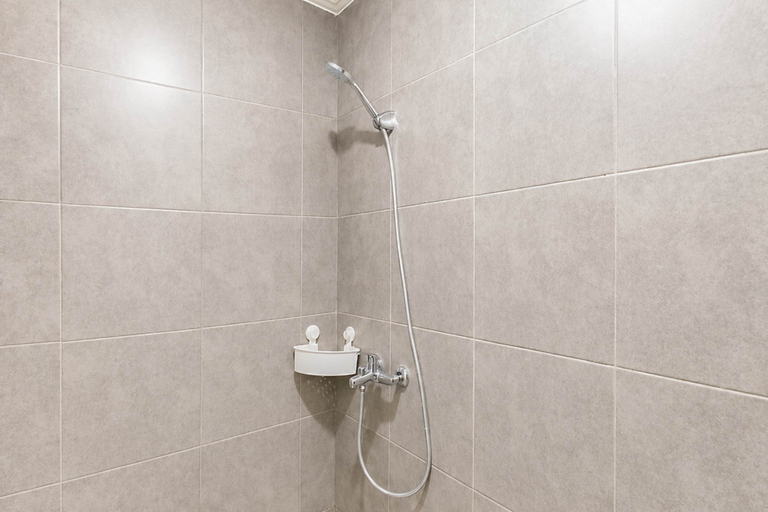 Bathroom 2, Pleasureable Studio Apartment at Westown View Surabaya By Travelio, Surabaya