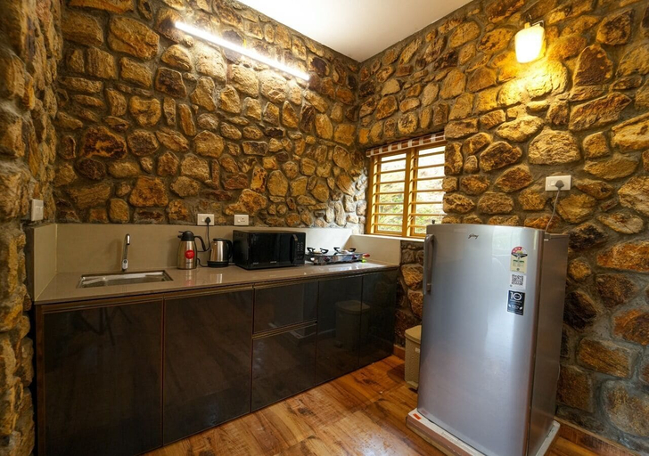 Private kitchen, Stone castle by voye homes, Idukki