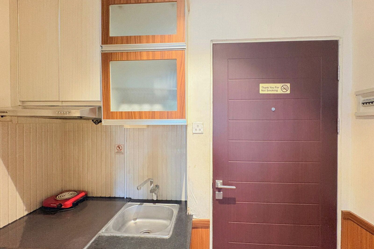 Private kitchen, Cozy Stay 2Br Apartment At Malioboro City, Sleman
