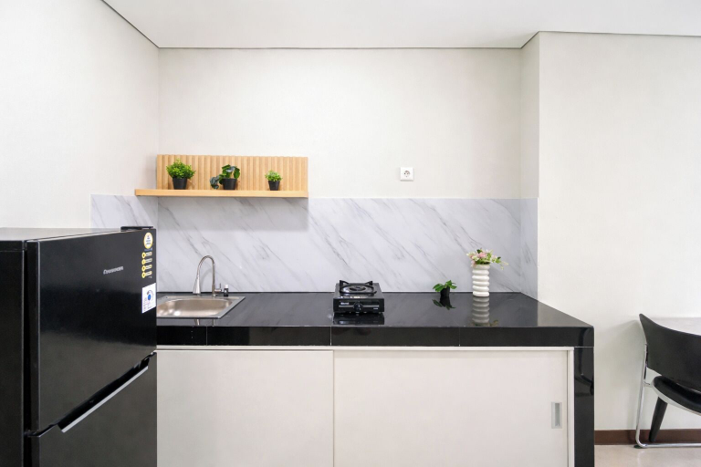 Private kitchen, Airy And Comfortable 2Br At Nifarro Park Apartment, South Jakarta