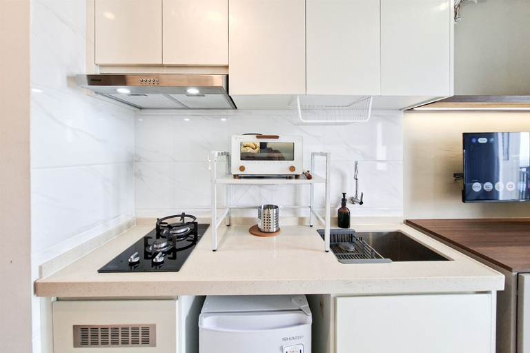 Private kitchen, Neat And Warm Studio Space At Apartment Sky House Bsd, South Tangerang