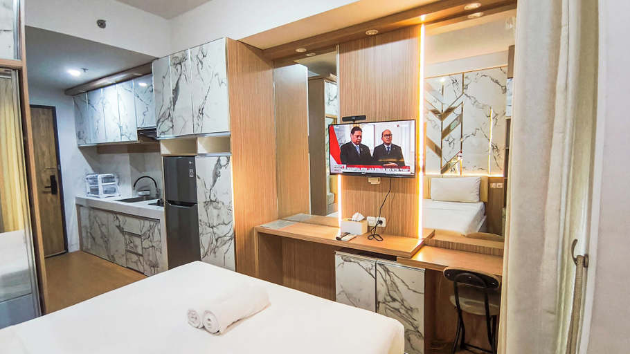 Television, Neat And Tranquil Studio At Delft Ciputra Makassar Apartment, Makassar