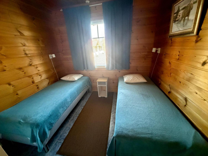 Bedroom 1, Taljatie Apartments, Lapland