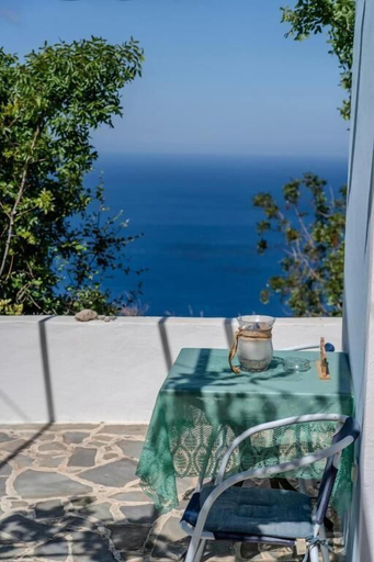 Outdoor banquet area, Irene's Cottage Myrtonas, South Aegean