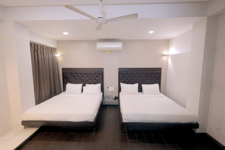 Room 5, Palm Greens Suites & Banquet, Surat