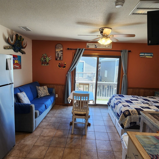 Living area 4, 9 Nautical Nine Studio Bedroom Condo by RedAwning, Dare