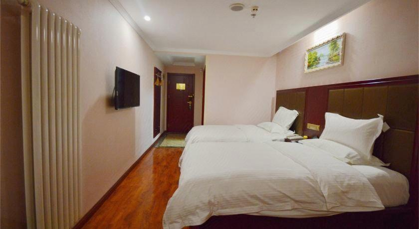 Bedroom 2, GreenTree Inn Nantong Haian Kaifa District Express Hotel, Nantong