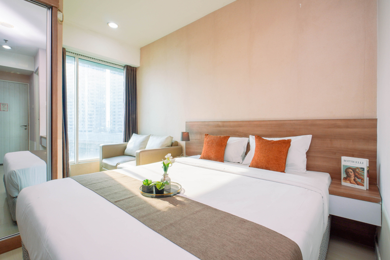 Bedroom 3, Chic Minimalist Studio at Apartment Grand Kamala Lagoon By Travelio, Bekasi
