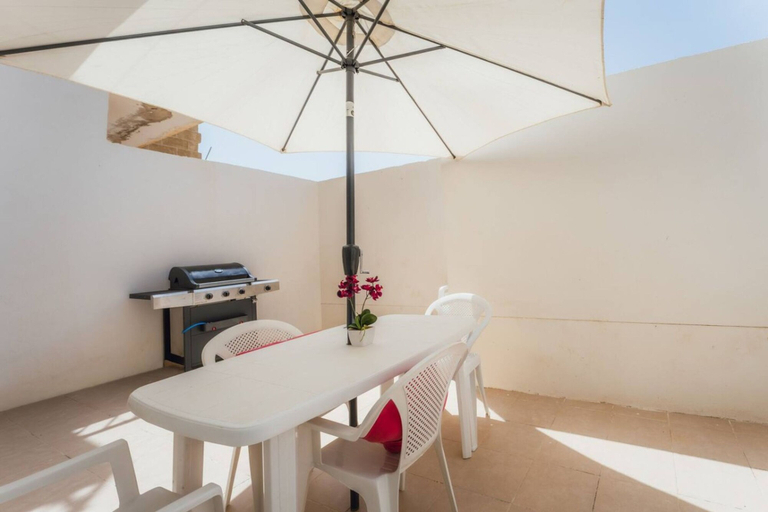 Room 4, Seafront Gozo Escape BBQ Backyard by Qbajjar Bay