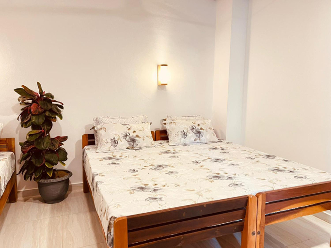 Bedroom 2, Sandy Beach Hotel, Pothuvil