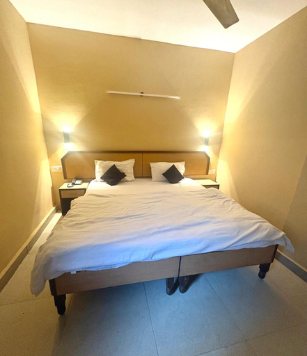 Bedroom, East Inn Hotel at Nirman Vihar Metro St., Delhi