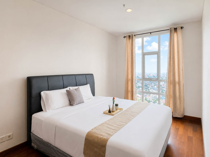 Bedroom 4, Serene and Spacious 3BR at Apartment Lucky Tower Residence By Travelio, Jakarta Barat