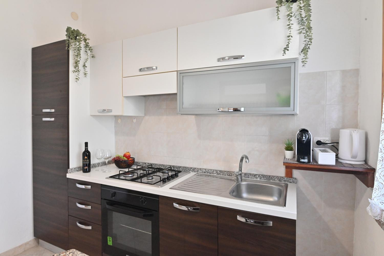 Others 5, IzzHome Central, Cagliari