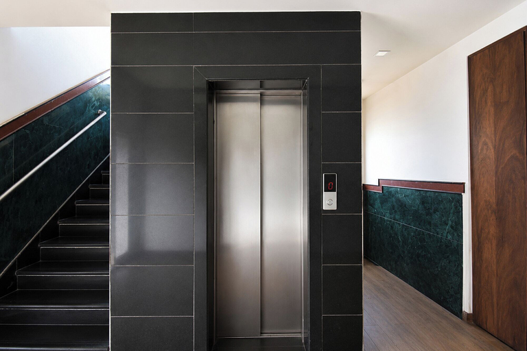 Elevator 5, Fabhotel Nirvana, Pune