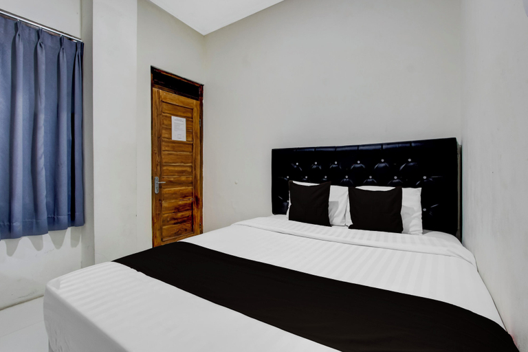 Room 4, Hotel O Airport Guesthouse, Semarang