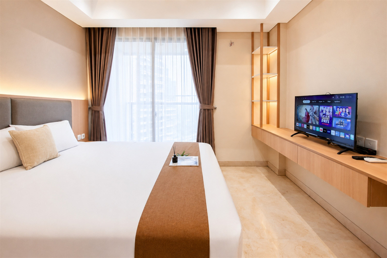 Bedroom 2, Homey and Warm Studio Room at Gold Coast Apartment By Travelio, Jakarta Utara