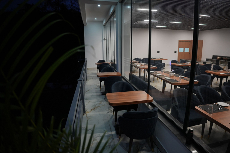 Outdoor dining, Divyam Resorts, Garhwal