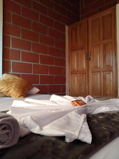 Bedroom, Mi pueblo natal Aptos y habitaciones, Necoclí