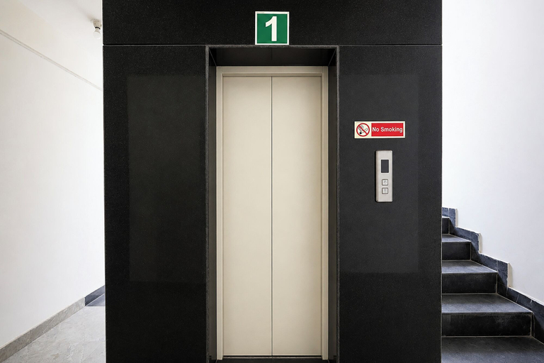 Elevator 2, Fabhotel Move Inn, Bangalore