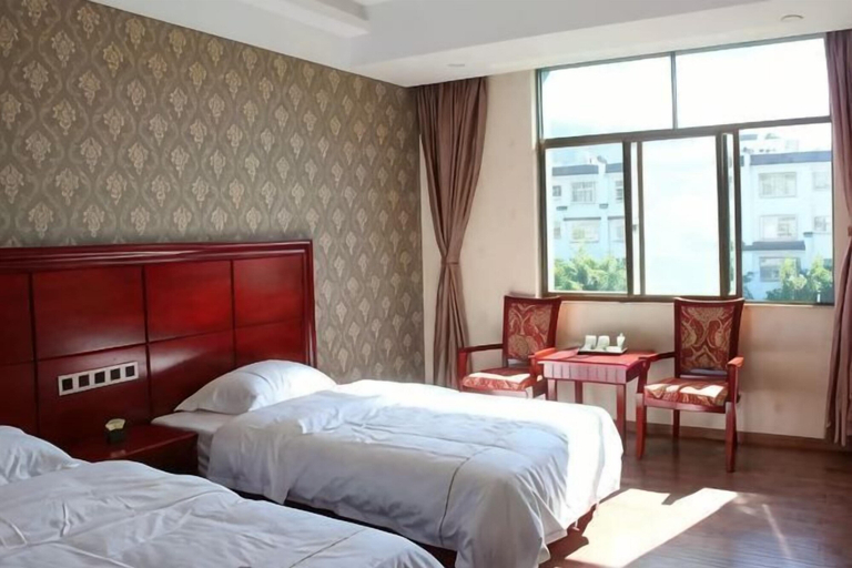 Bedroom 1, Zhen Kangxin Futai Hotel, Kunlong