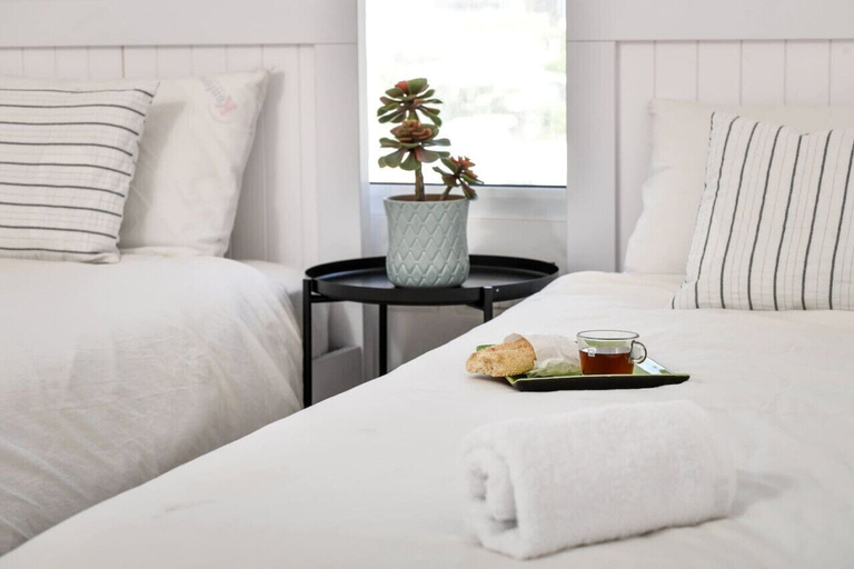 Bedroom 3, Modern Gem with Stunning Balcony by Sea N Rent