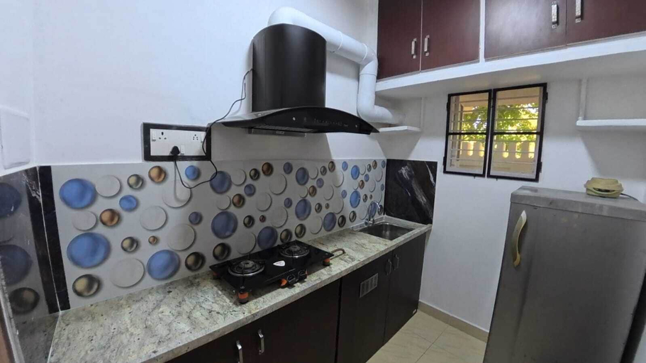 Private kitchen, Thulasi My Village My Resort, Thanjavur