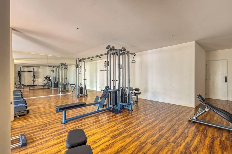 Fitness facility 2, Spacious Condo With Private Washer/dryer, City Views, and Shared Pool, La Paz