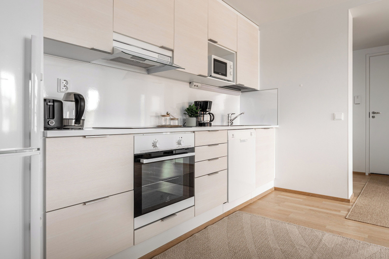 Private kitchen 5, Modern Nordic 2BR Apt in Kuopio Center, North Savonia