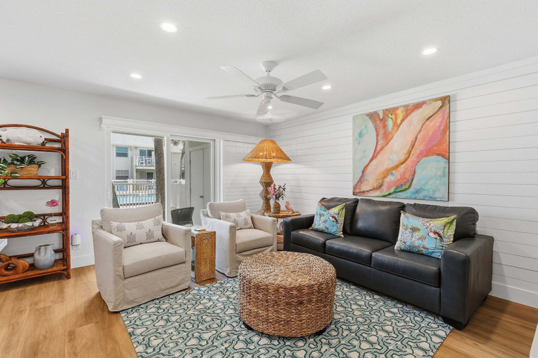 Living area 2, Relaxing King Suite With Poolside Patio & Partial Ocean Views, Volusia
