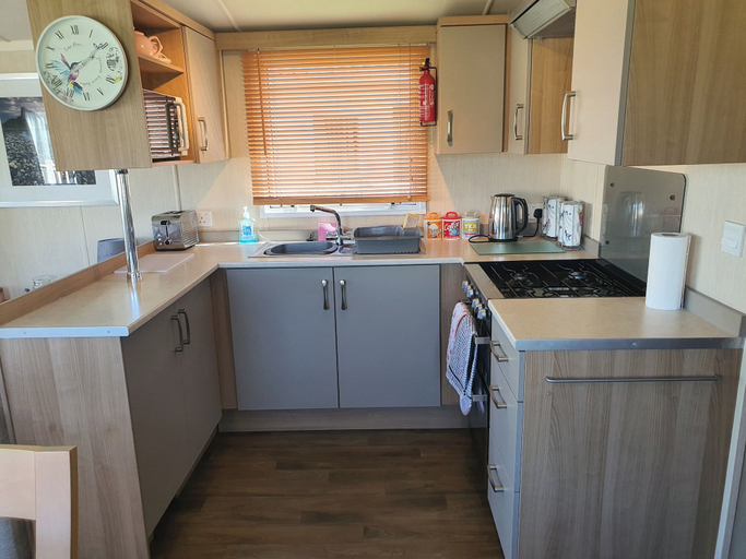 Private kitchen, 3-bed Caravan, Sleeps 8 With Enclosed Decking, Lancashire