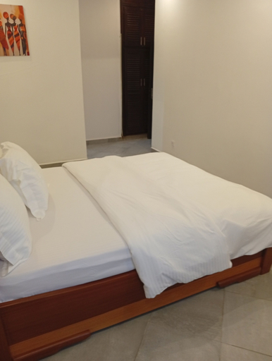 Room 5, Résidence Prestige KGV Appt 302, Wouri