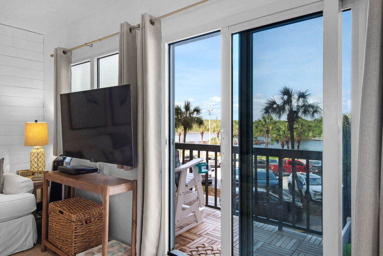 Living area 2, Beachfront PCB 2BR Condo w Pools, Tennis & Gulf Views + Free Attraction Tix!, Bay