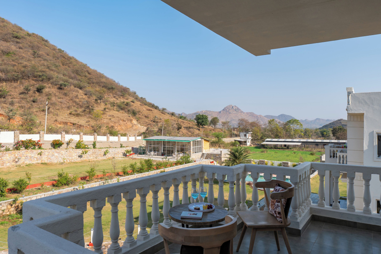 Outdoor dining 5, ELIVAAS Mandovar 4Room with Common Pool, Udaipur