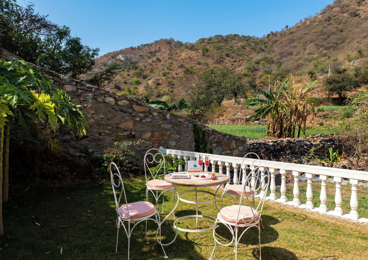 Outdoor dining 2, ELIVAAS Mandovar 4Room with Common Pool, Udaipur