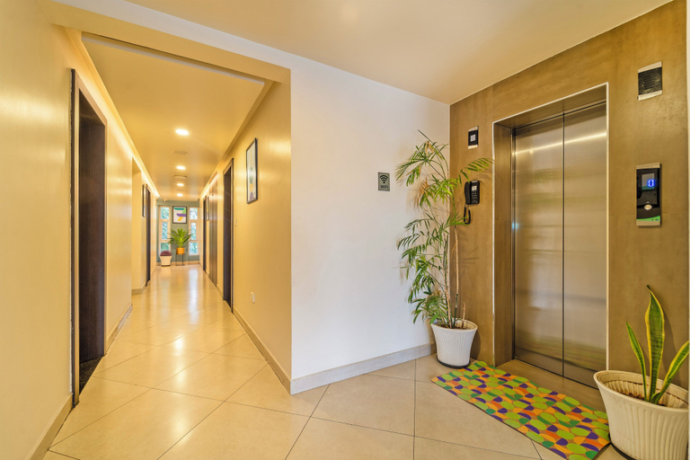 Elevator 4, Treebo Premium Lavender Kochi Infopark, Ernakulam