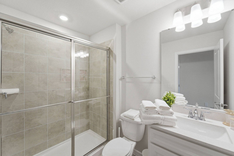Bathroom 3, 5BR Windsor Cay Home Near Disney, Pool & Games, Lake