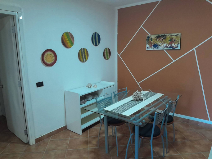 Dining room, Serene 1-bedroom Apartment With Shared Pool in Boca Chica, Boca Chica