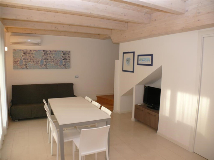 Dining room, A Tranquil Getaway for Seven Guests in Bibione, Venezia