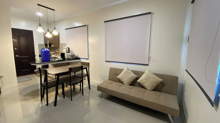 Living area, Peaceful 2BR Home in Gensan - AC, Wifi, Netflix, Patio & Free Parking, General Santos City