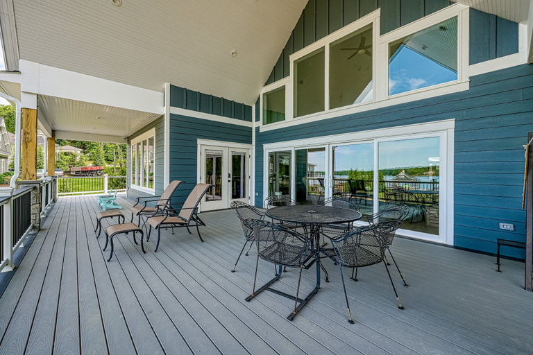 Outdoor dining 5, Dog-friendly Lakefront Home With a Game Room, Children's Items, and Firepit, Louisa