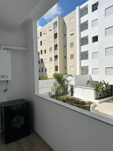 Laundry, Luxurious Apartment in La Soukra Comfort Meets Convenience, Bouhaira
