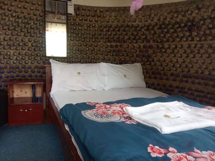 Bedroom 2, Room-plastic Bottles House, Busiiro