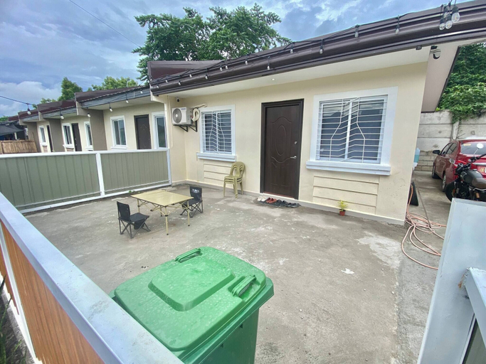 Outdoor dining 4, Peaceful 2BR Home in Gensan - AC, Wifi, Netflix, Patio & Free Parking, General Santos City