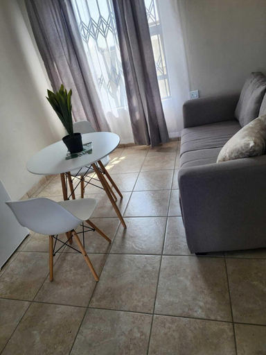 Dining 5, Room-khutsong Apartmentss, Gert Sibande